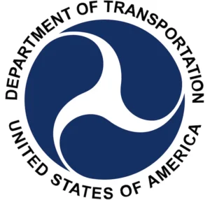 U.S. Department of Transportation seal with blue circular triskelion symbol and black text